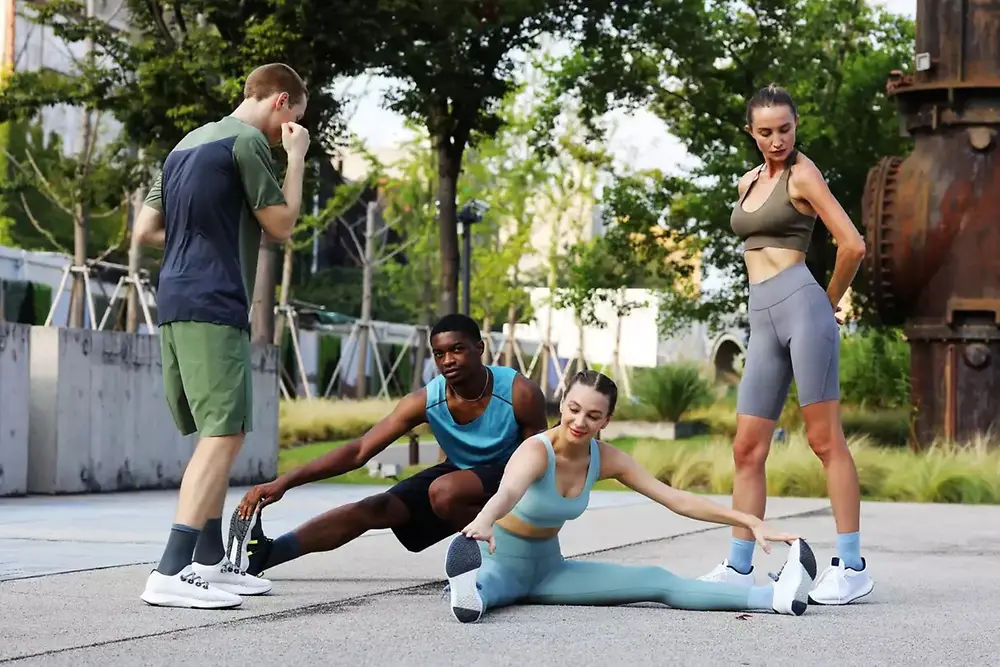 Group of people enjoying outdoor sports activity in an urban park.